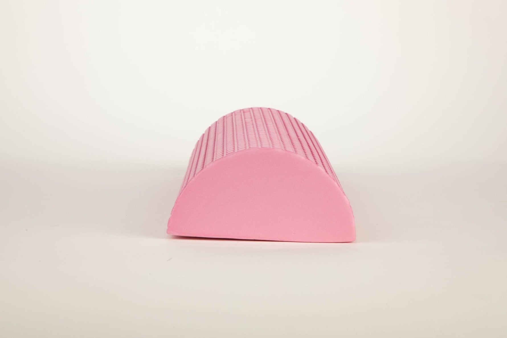 Pink BBL recovery kit contents – cushion pillow, toilet riser, bookbag, and urinal 